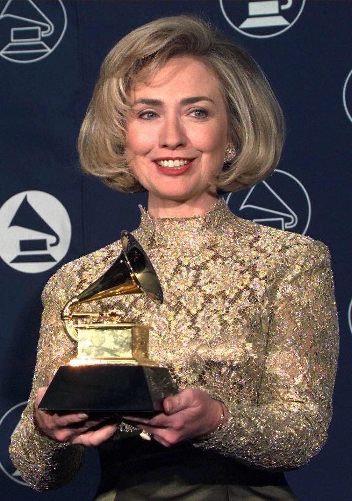 Hillary Rodham Clinton holds up her Grammy Award 2